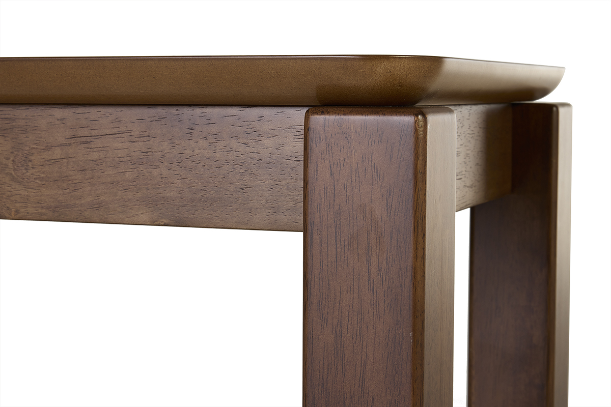 Dettaglio della console in legno scuro noce RAYA, vista ravvicinata sul piano e sugli angoli.