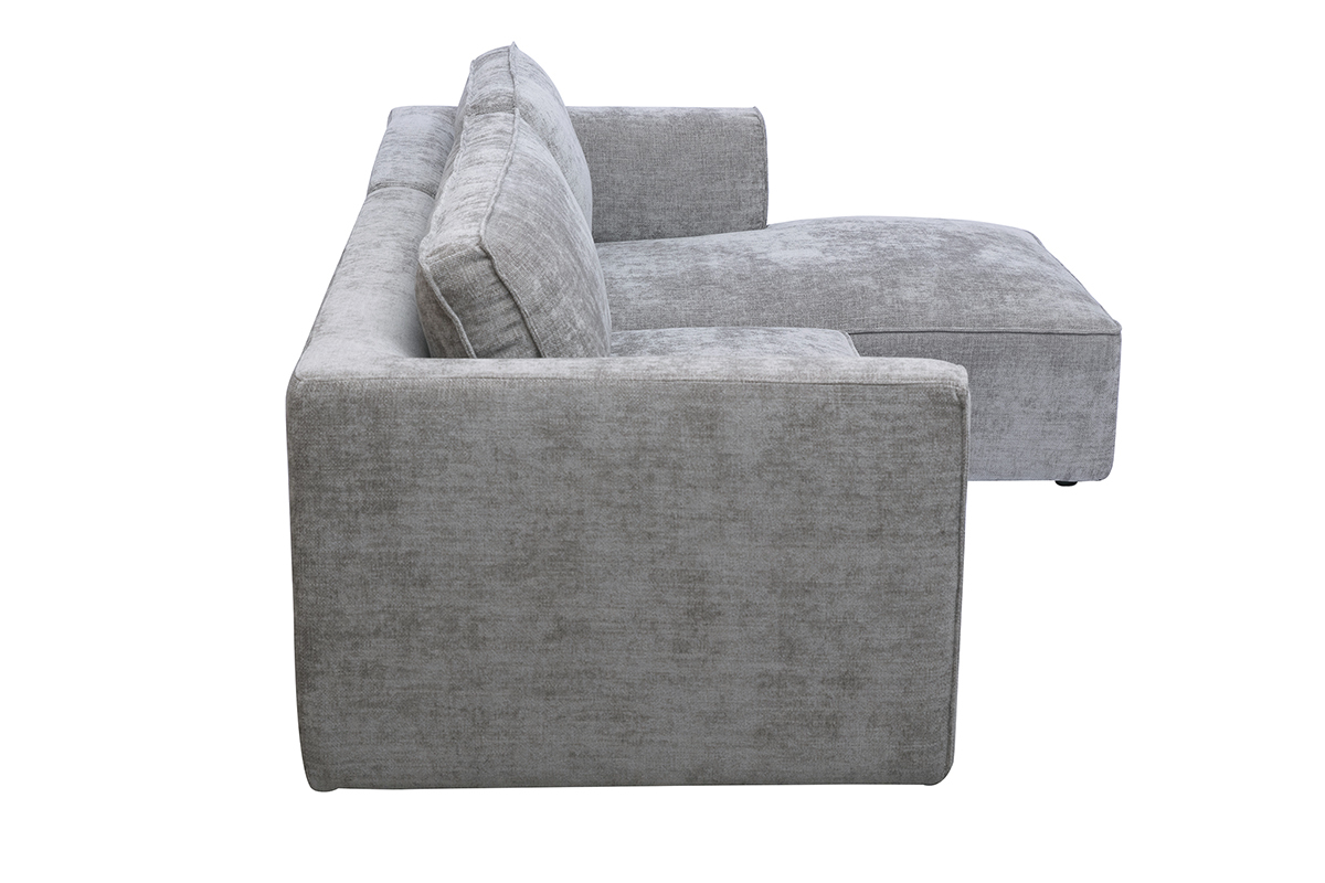 Divano ad angolo destro grigio in tessuto effetto velluto, vista laterale.