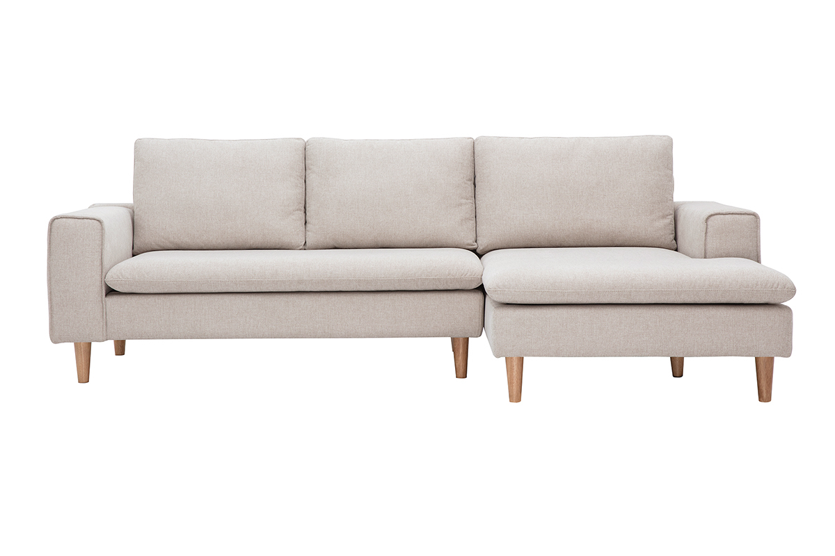 Divano ad angolo destro in tessuto beige con gambe in legno chiaro, vista frontale.