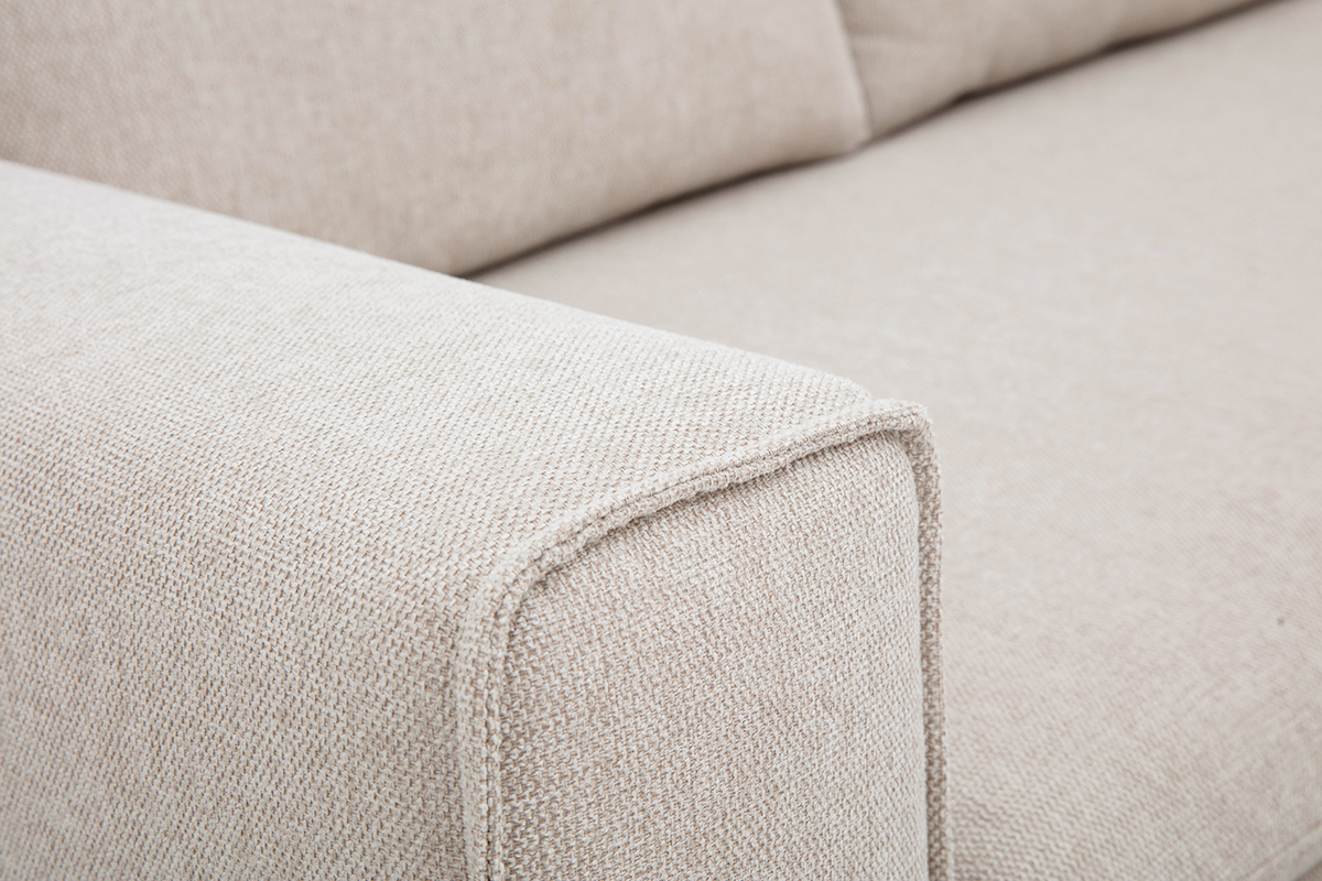 Dettaglio tessuto effetto velluto testurizzato beige del divano RAGNAR.