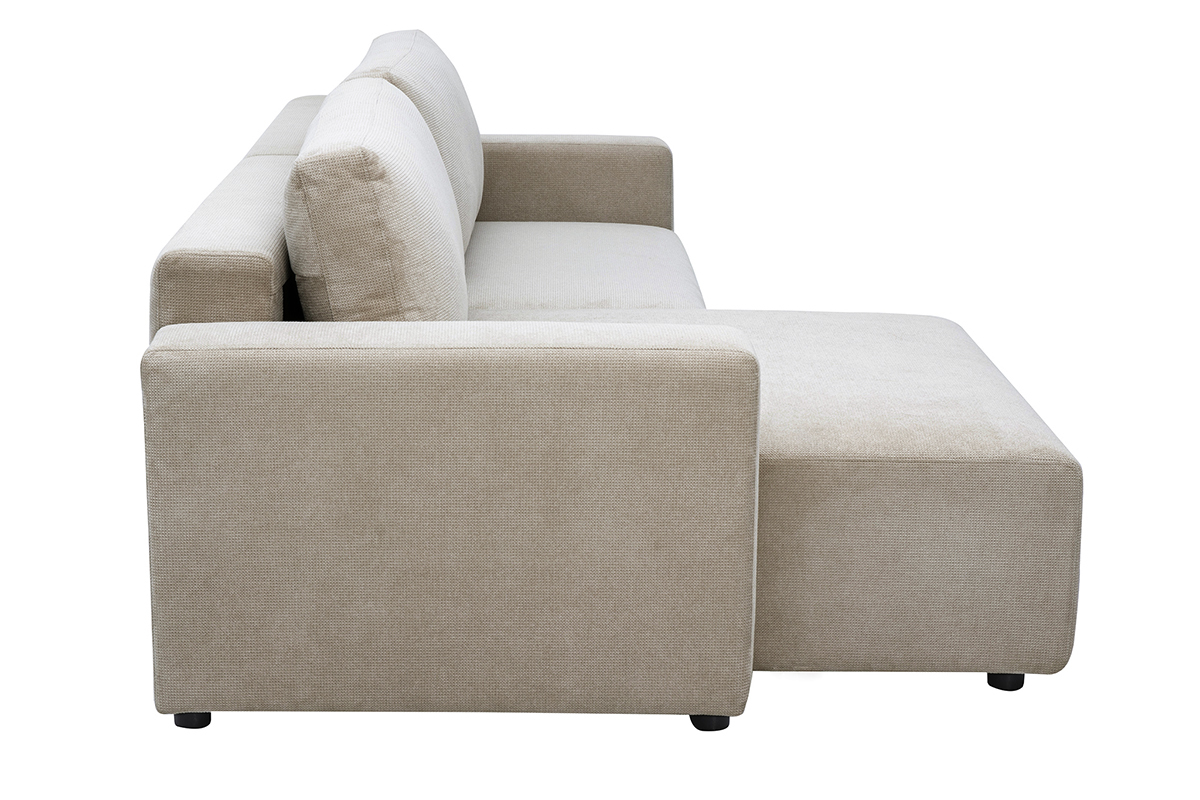 Divano angolare convertibile reversibile NESTO in tessuto ciniglia beige, vista laterale.