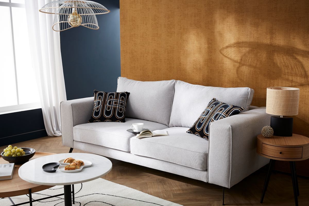 Divano design 4 posti in tessuto grigio e metallo nero OSMANN