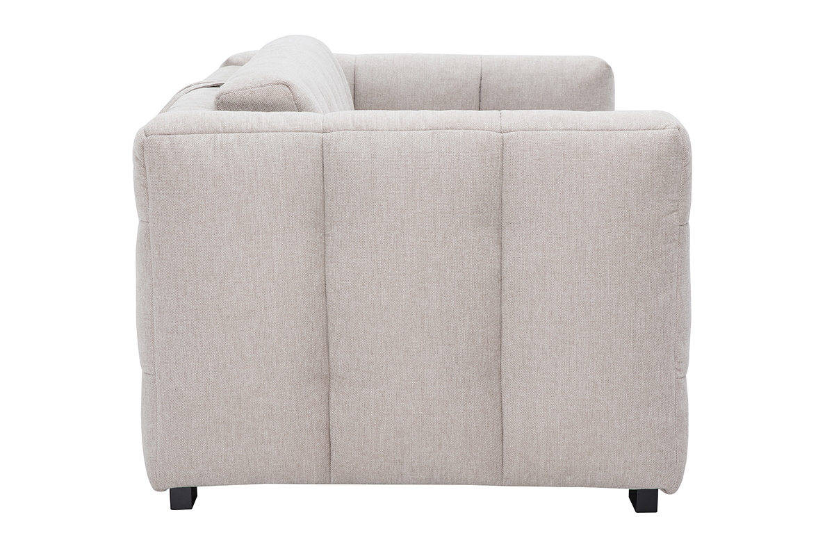 Divano letto beige effetto velluto visto da lato.