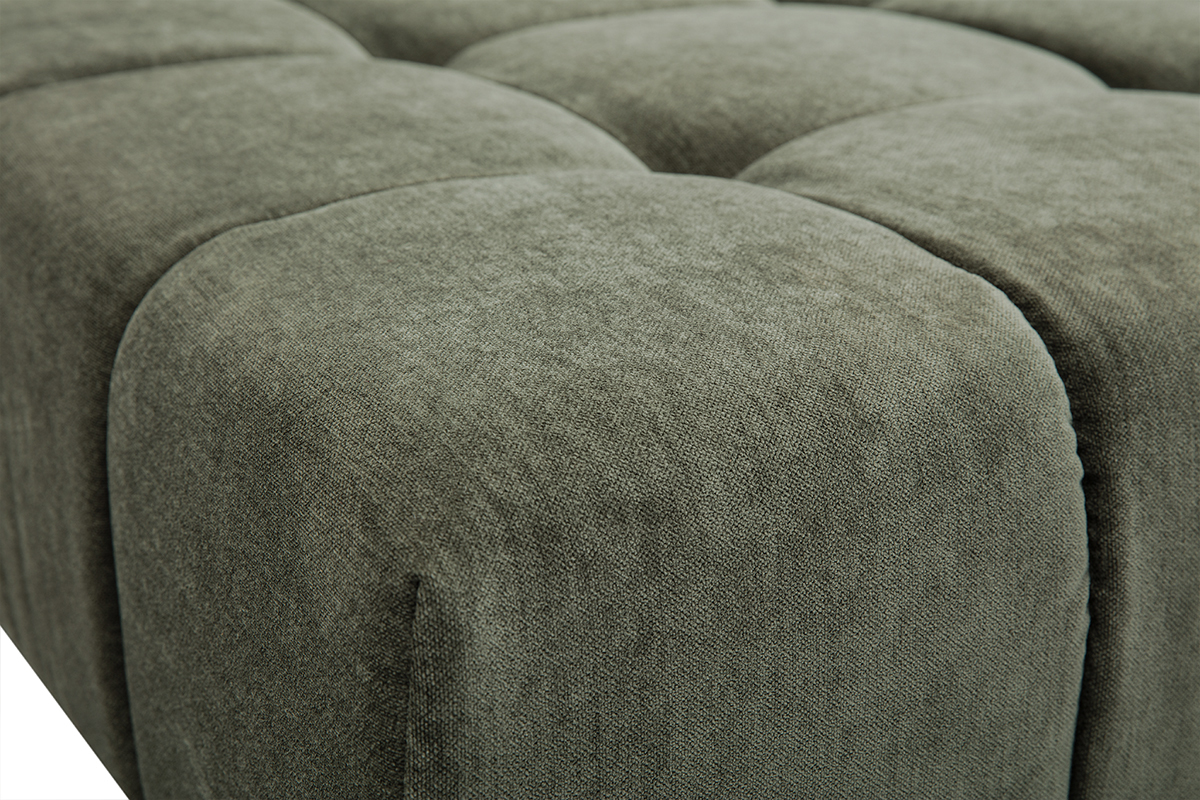 Primo piano sul tessuto effetto velluto verde kaki del divano modulare OLMO.