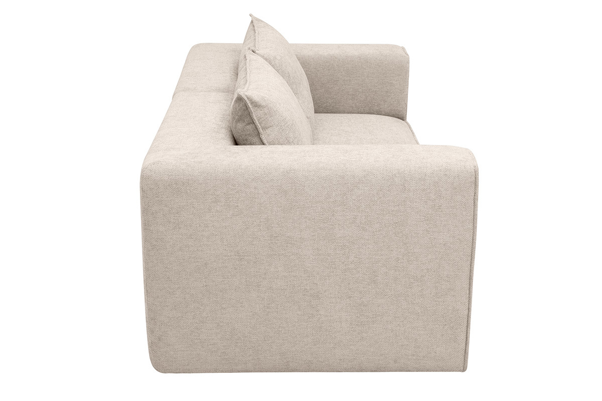 Divano modulare a 2 posti beige visto di profilo con cuscini morbidi.