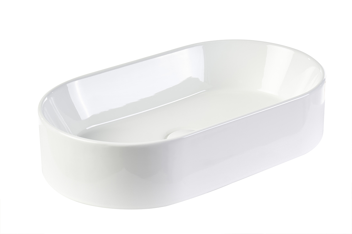 Lavabo ovale in ceramica bianca L52,5 cm, vista a 3/4, finitura lucida.