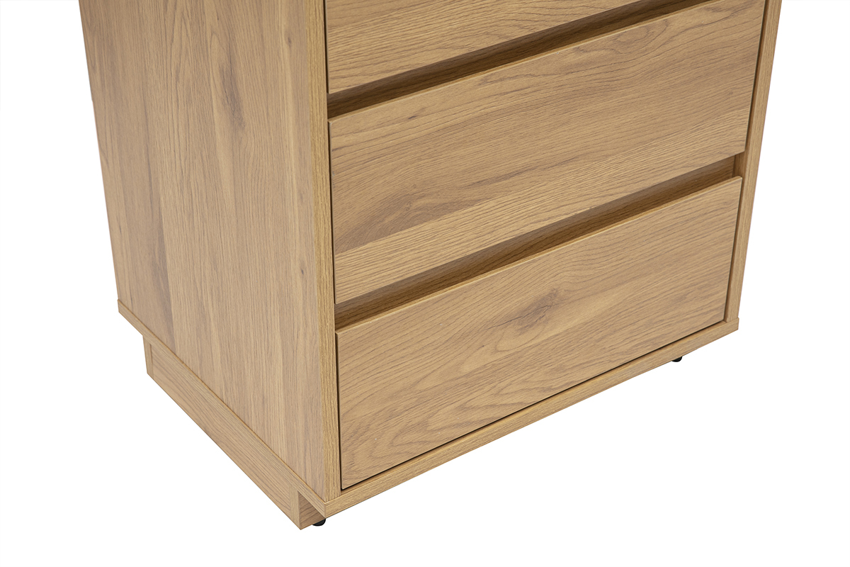 Libreria in legno chiaro con cassetti, vista dall'alto.