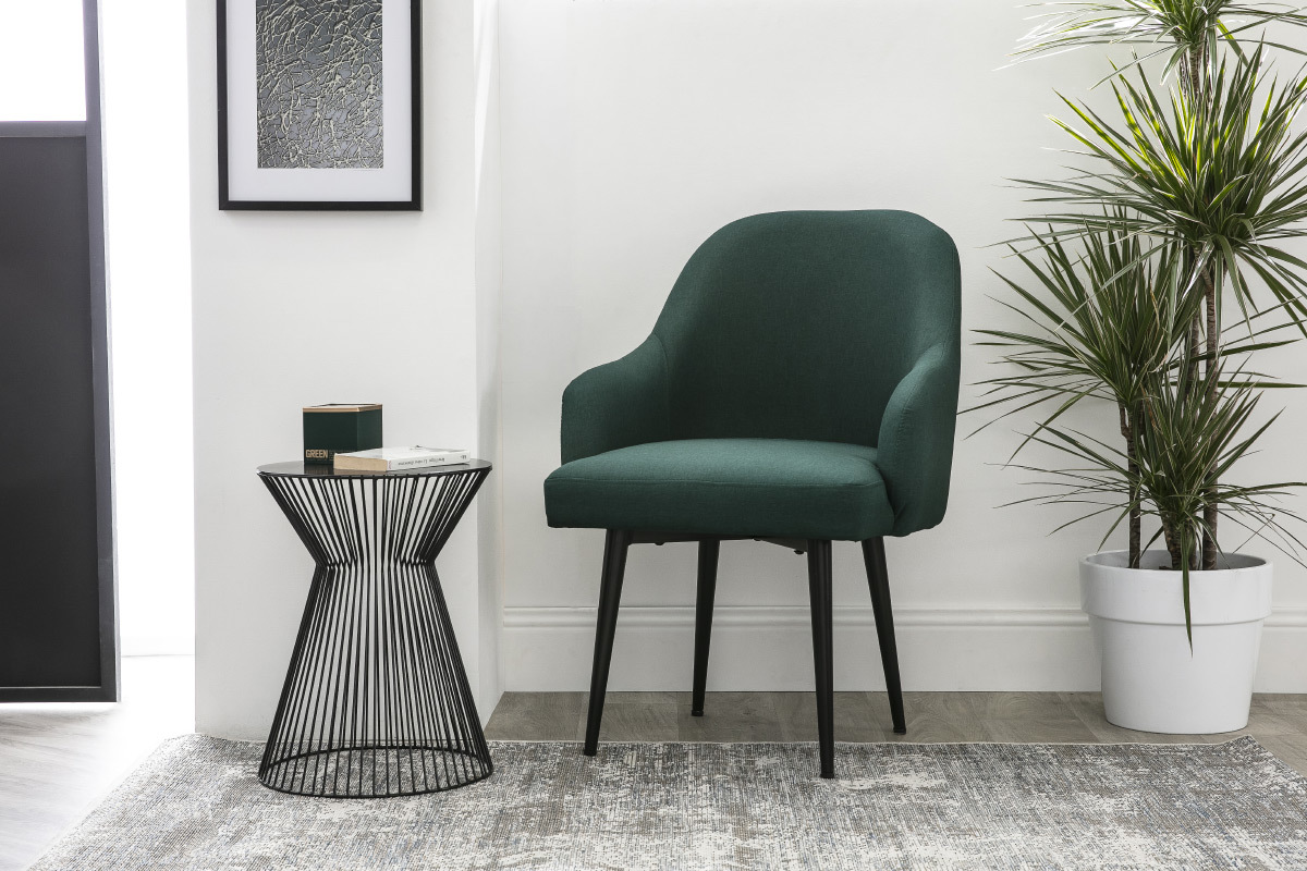 Poltrona design in tessuto verde scuro e piedi in metallo nero AMON