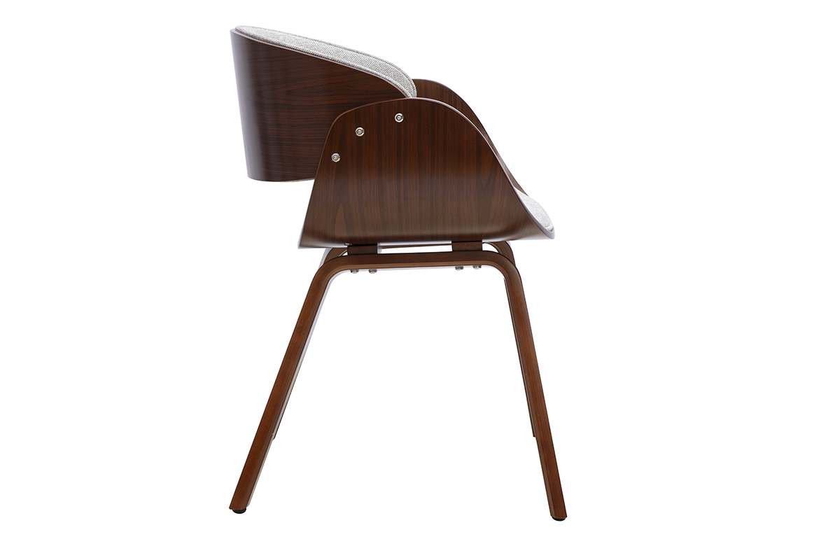 Sedia di design in tessuto grigio con braccioli e base in legno scuro, vista di profilo.