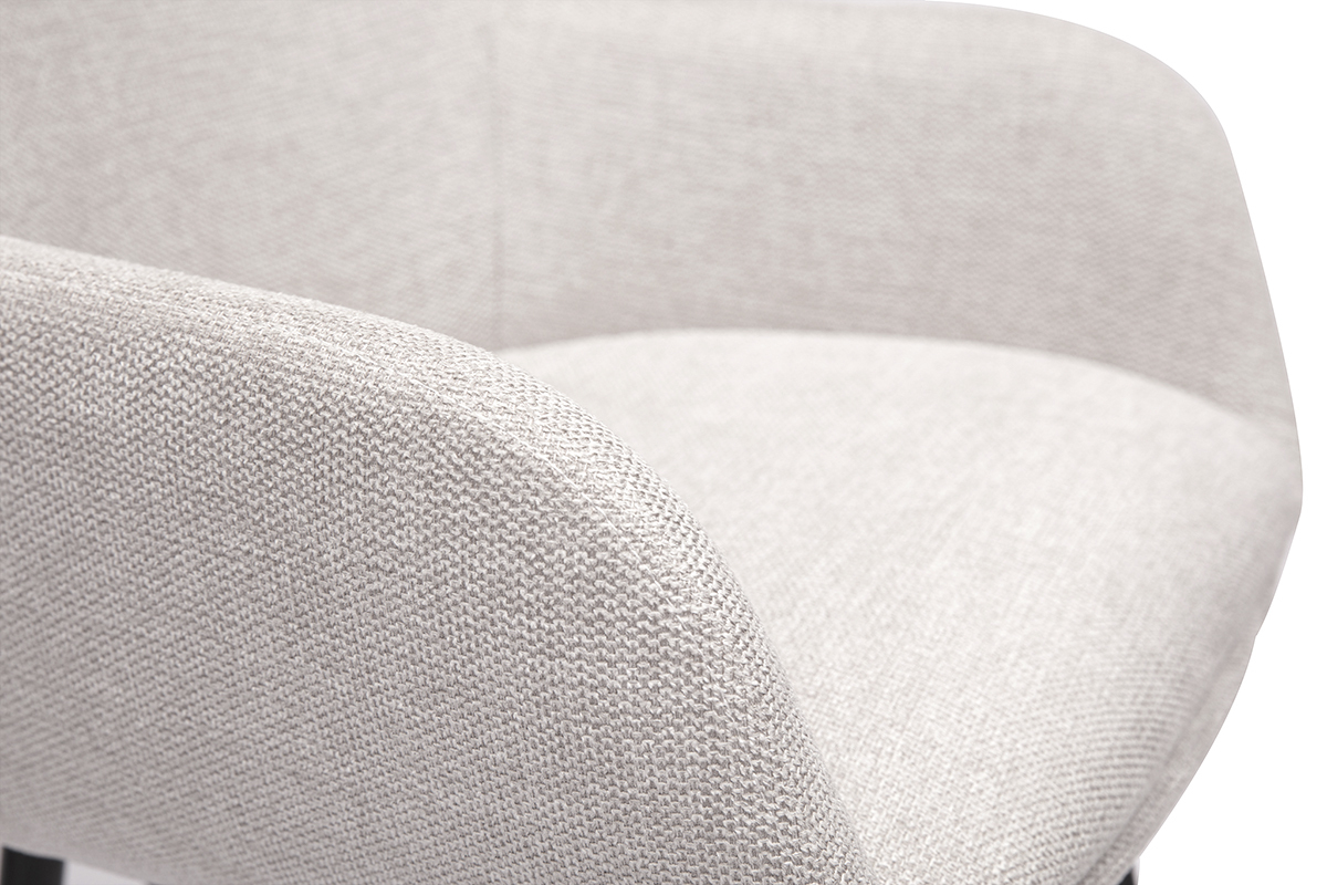 Primo piano di uno sgabello da bar in tessuto beige effetto velluto testurizzato.