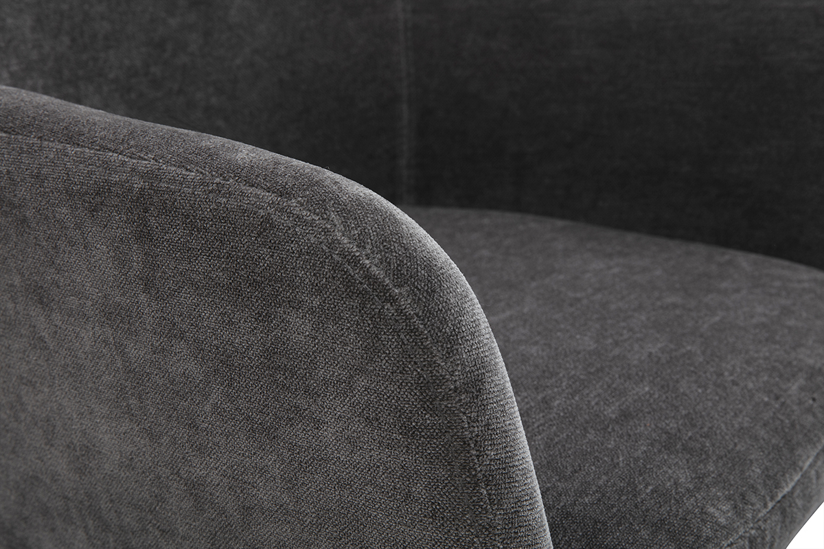 Primo piano sul tessuto effetto velluto grigio scuro di uno sgabello da bar AMIKA.